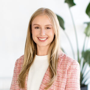 A headshot of Riley Johnson