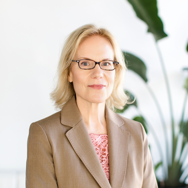 A headshot of Denise Guzzetta