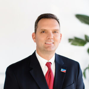 A headshot of Cory Buck