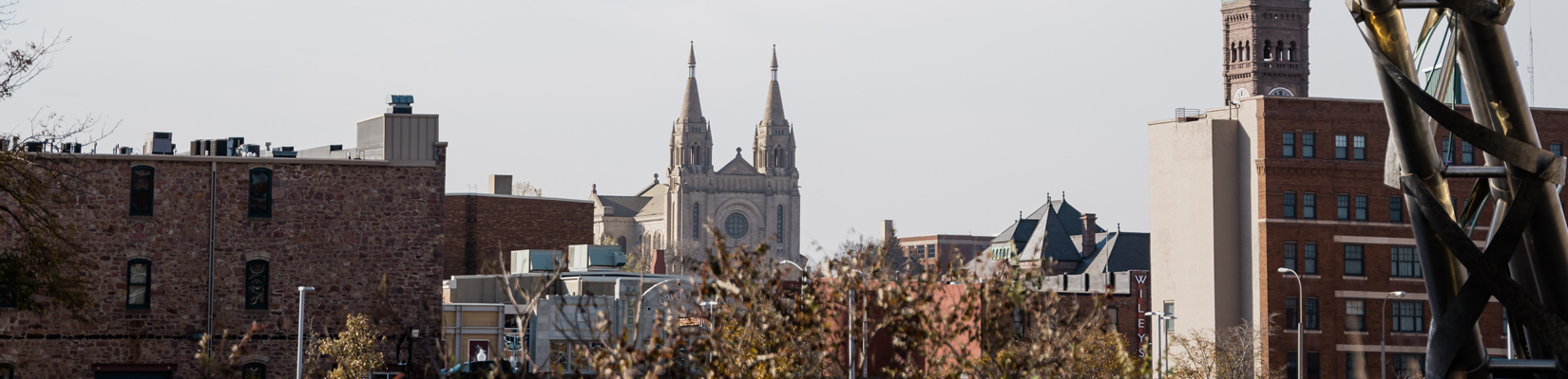 A photo of Downtown Sioux Falls, SD, with the St. Joseph Cathedral in the background