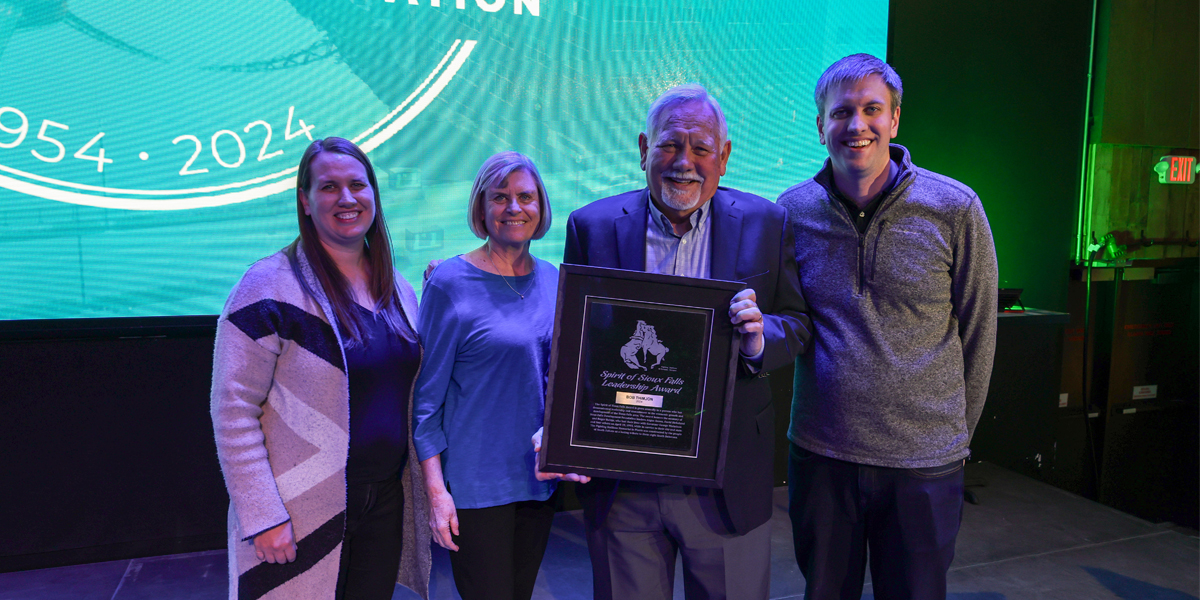 Bob Thimjon and family with Spirit of Sioux Falls Award