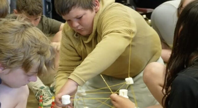 Students build towers with spaghetti noodles