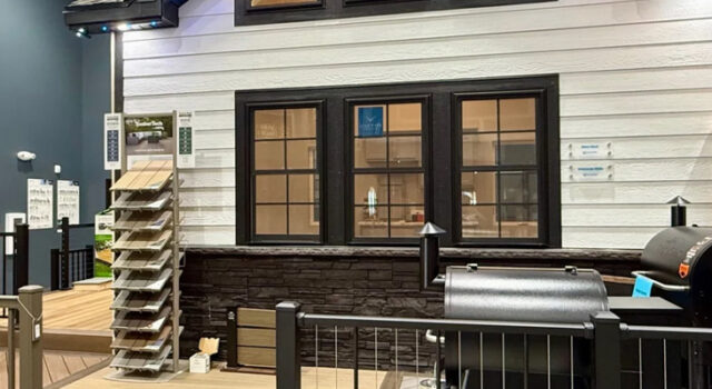 A picture of a house facade in a showroom