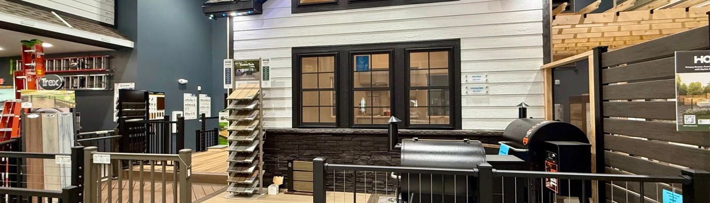 A picture of a house facade in a showroom