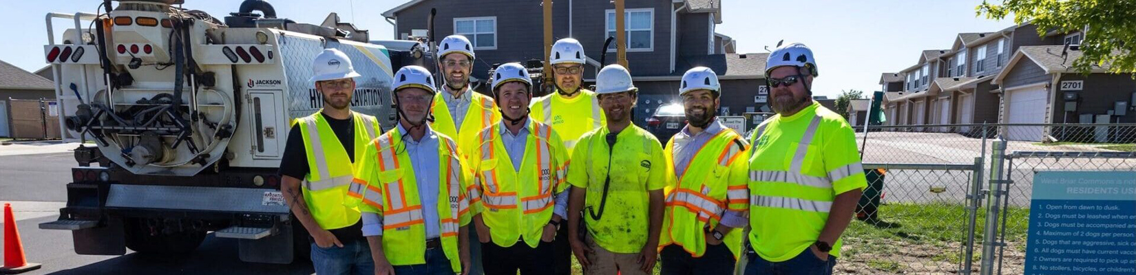 A photo of workers in safety gear