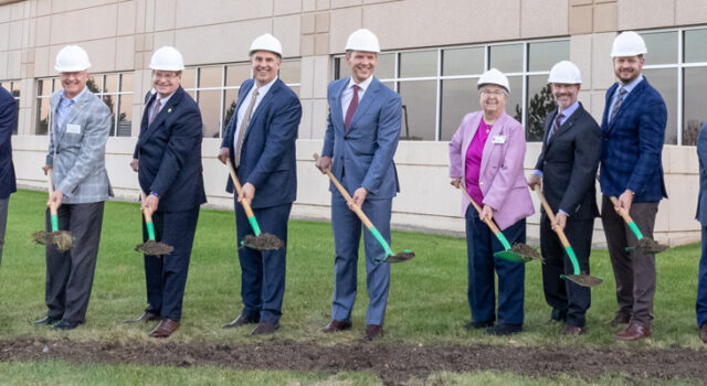A photo of people standing with shovels at the Avera Heart Hospital expansion groundbreaking