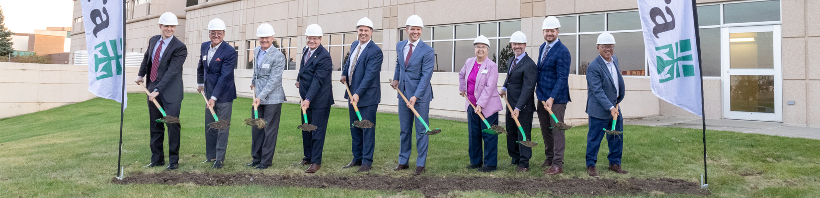 A photo of people standing with shovels at the Avera Heart Hospital expansion groundbreaking