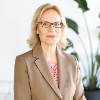 A headshot of Denise Guzzetta