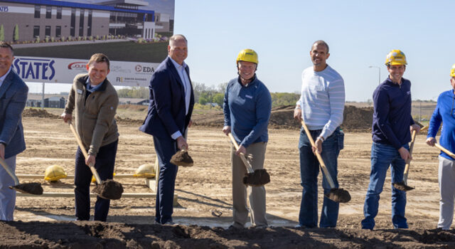 A photo of people holding shovels at the Interstates groundbreaking